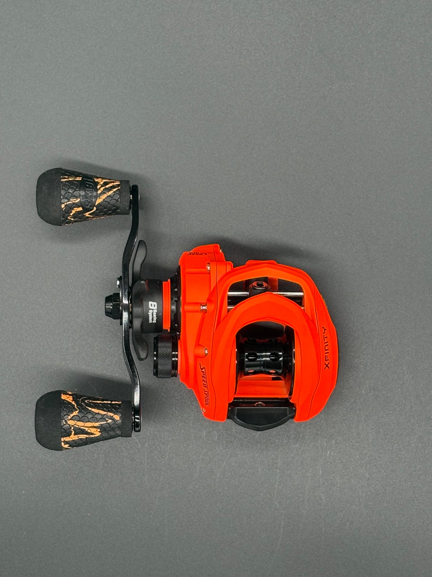Lews Xfinity Speed Spool (Hunters Orange) Bait Caster Left Hand