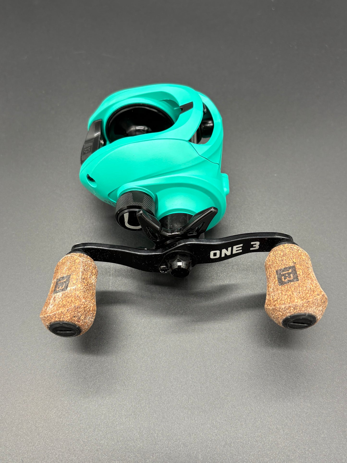 13 Fishing Origin Teal Bait Caster Right Hand 7:3