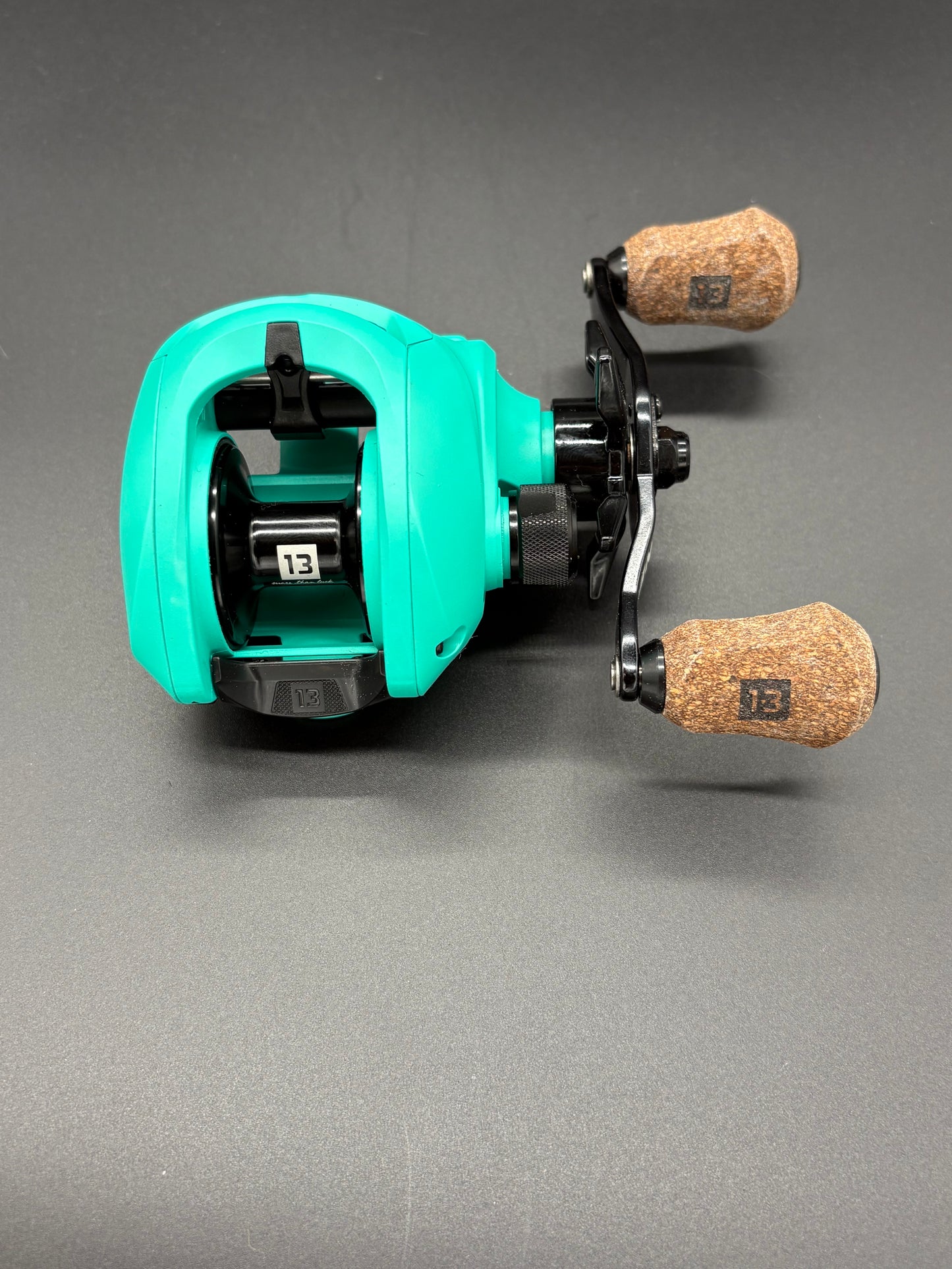13 Fishing Origin Teal Bait Caster Right Hand 7:3