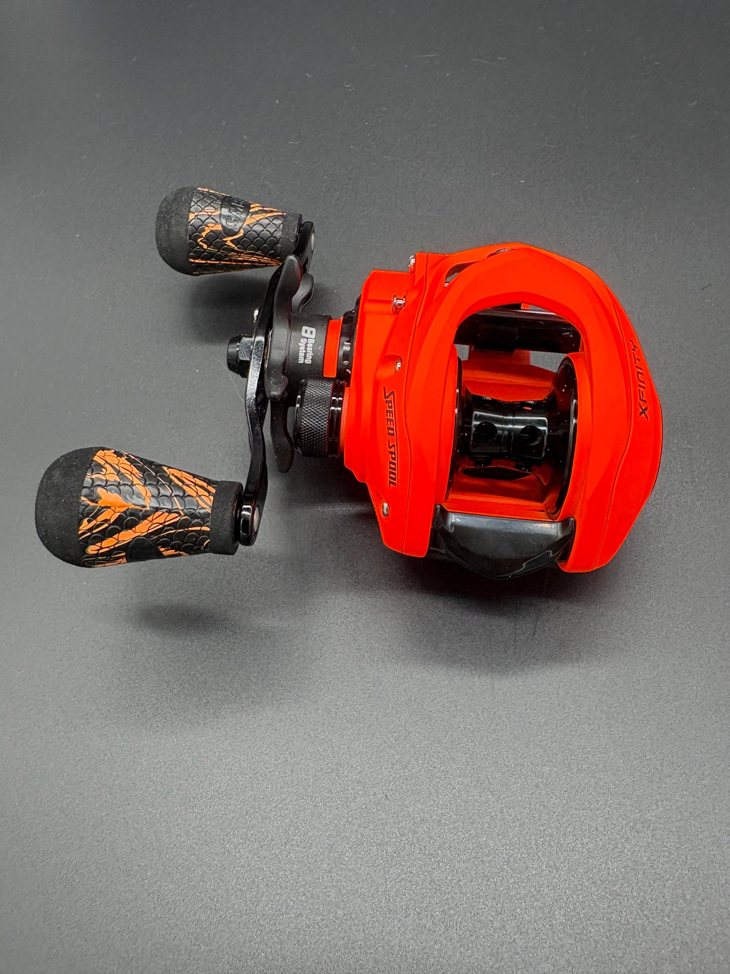 Lews Xfinity Speed Spool (Hunters Orange) Bait Caster Left Hand